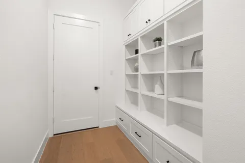 a view of an empty walk in closet