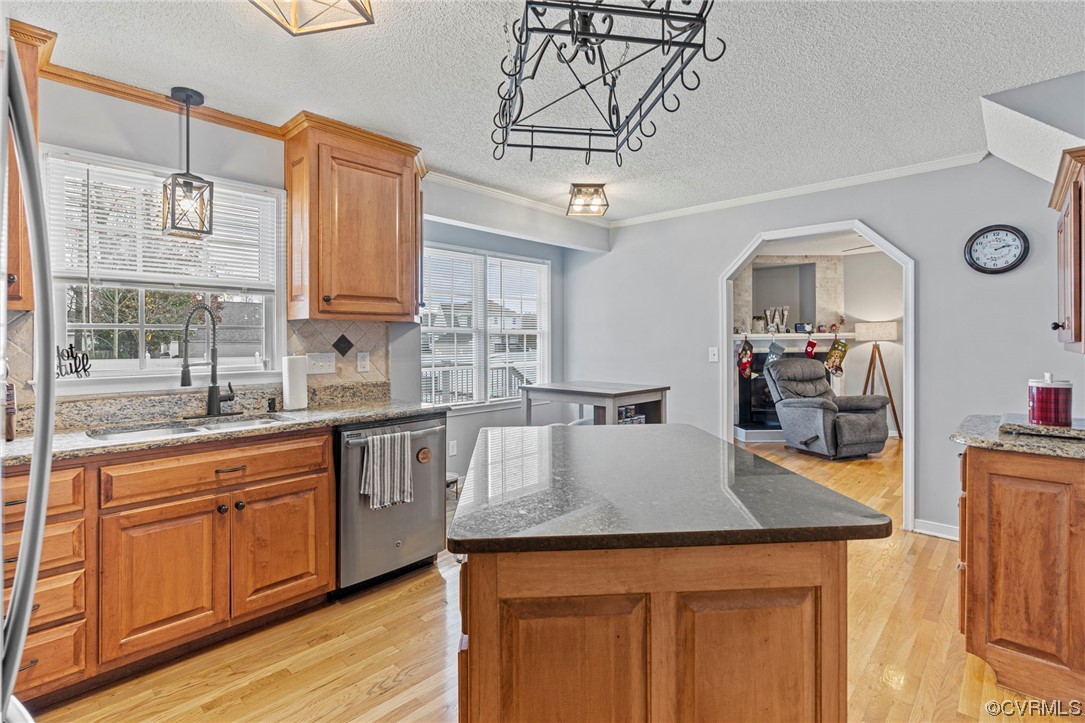 6441 Blair Court Prince George, VA 23875 - Photo 12 of 46 a kitchen with kitchen island granite countertop a sink cabinets and wooden floor