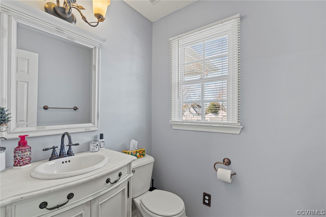 6441 Blair Court Prince George, VA 23875 - Photo 19 of 46 a bathroom with a sink and a mirror