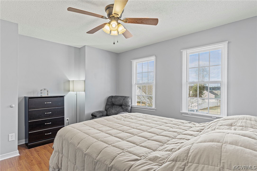 6441 Blair Court Prince George, VA 23875 - Photo 23 of 46 a bedroom with a bed and a window