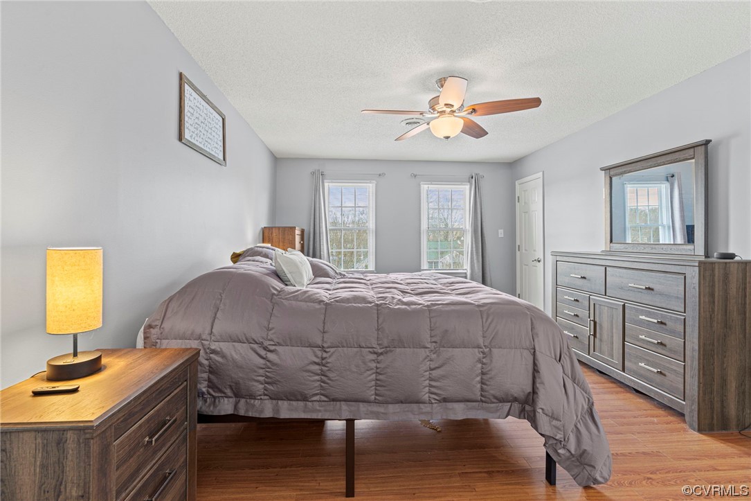 6441 Blair Court Prince George, VA 23875 - Photo 25 of 46 a bedroom with a bed and a dresser