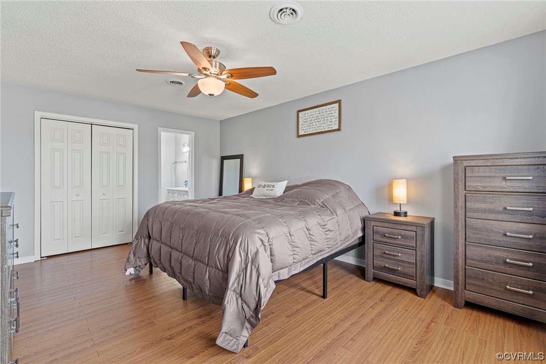 6441 Blair Court Prince George, VA 23875 - Photo 26 of 46 a bedroom with a bed and wooden floor