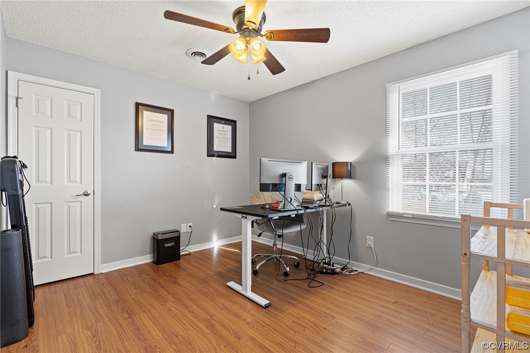 6441 Blair Court Prince George, VA 23875 - Photo 30 of 46 a view of a workspace with furniture and a window