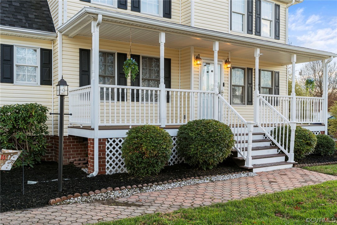6441 Blair Court Prince George, VA 23875 - Photo 5 of 46 front view of a house with a garden