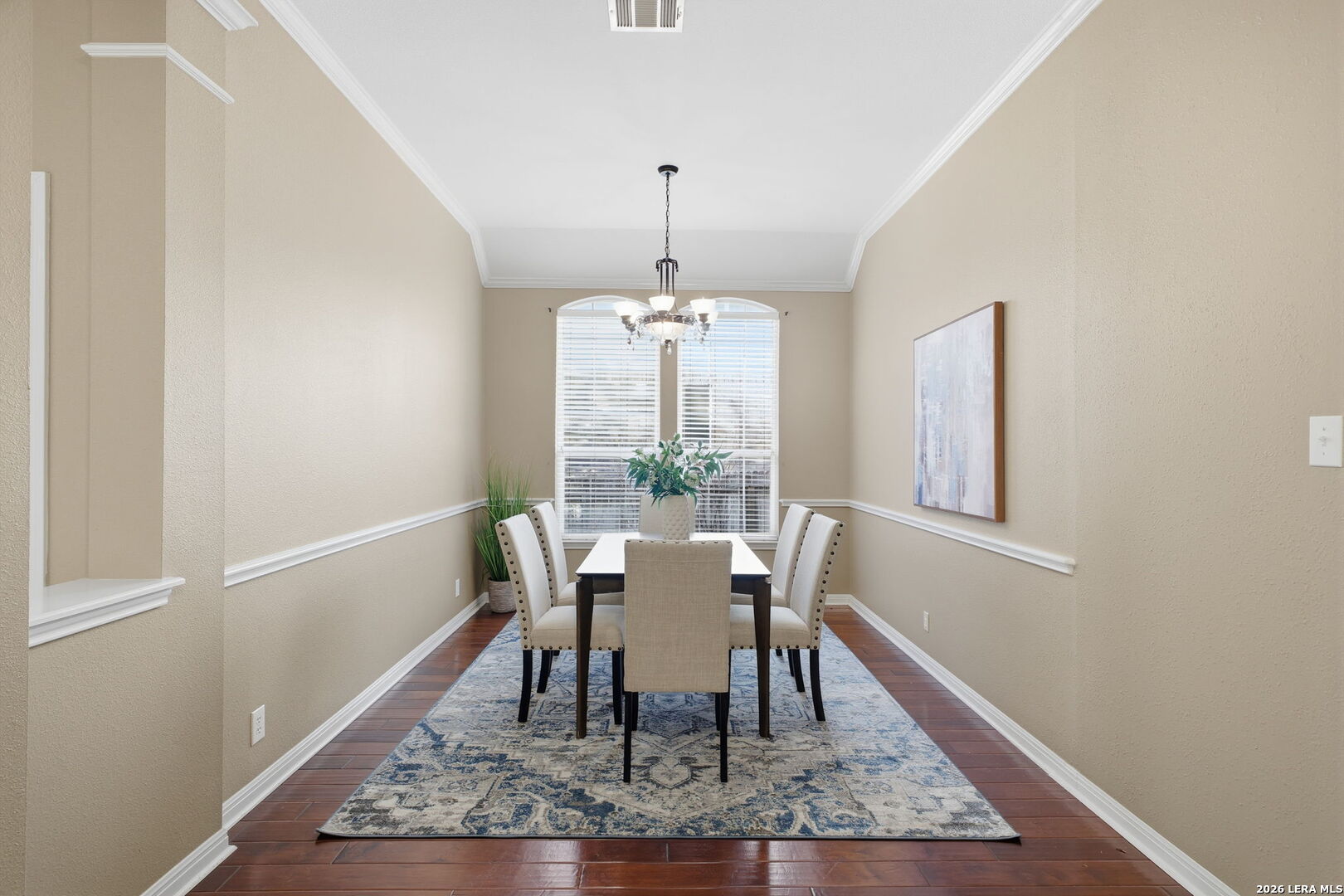 527 Mesa Ridge San Antonio, TX 78258 - Photo 12 of 36 a dining room with furniture window and wooden floor