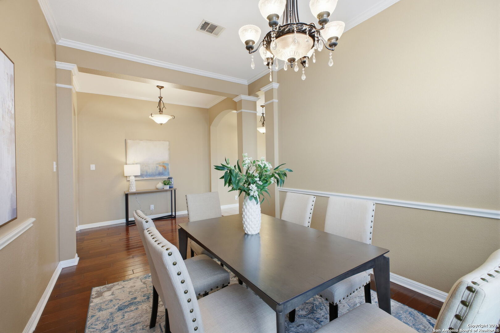 527 Mesa Ridge San Antonio, TX 78258 - Photo 13 of 36 a view of a dining room with furniture and wooden floor