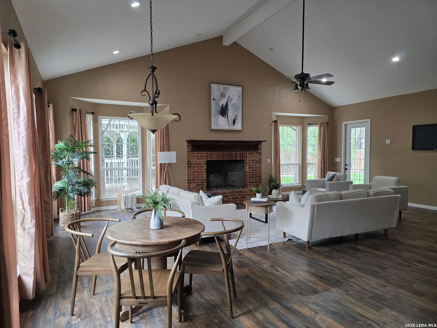 527 Mesa Ridge San Antonio, TX 78258 - Photo 19 of 36 a view of a dining room with furniture window and wooden floor