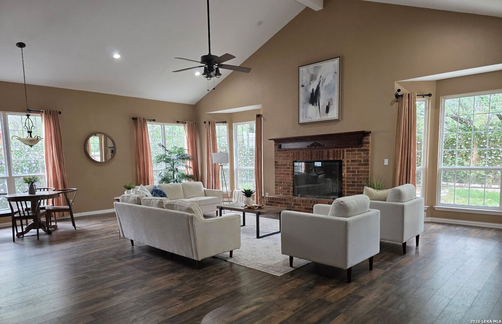 527 Mesa Ridge San Antonio, TX 78258 - Photo 20 of 36 a living room with furniture and a fireplace
