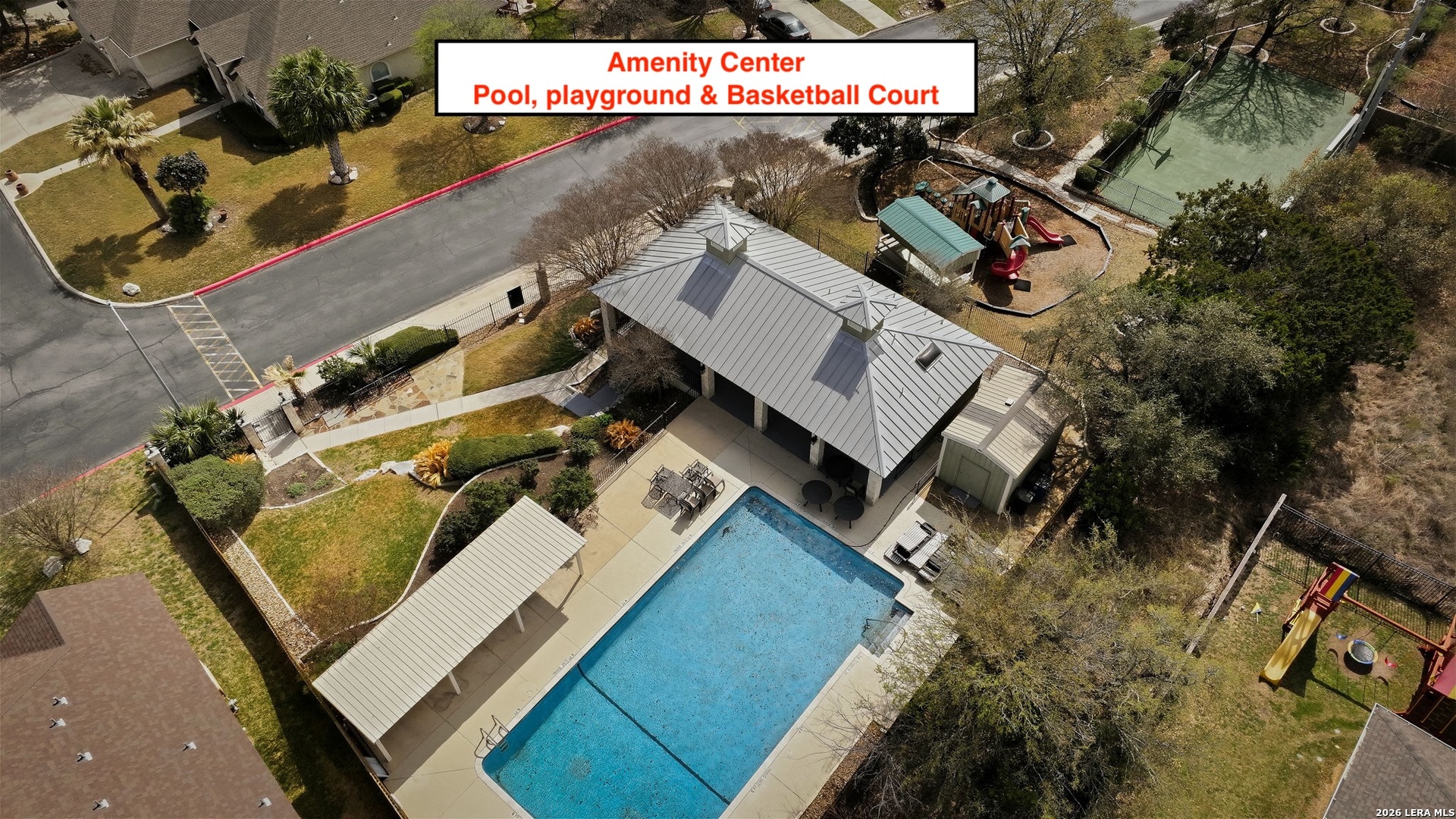 527 Mesa Ridge San Antonio, TX 78258 - Photo 34 of 36 an aerial view of a house with a yard