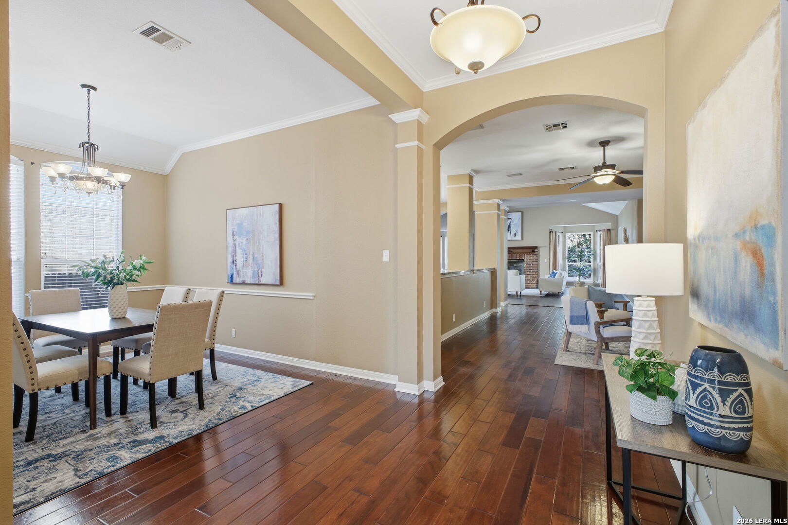 527 Mesa Ridge San Antonio, TX 78258 - Photo 5 of 25 a view of a dining room with furniture window and wooden floor