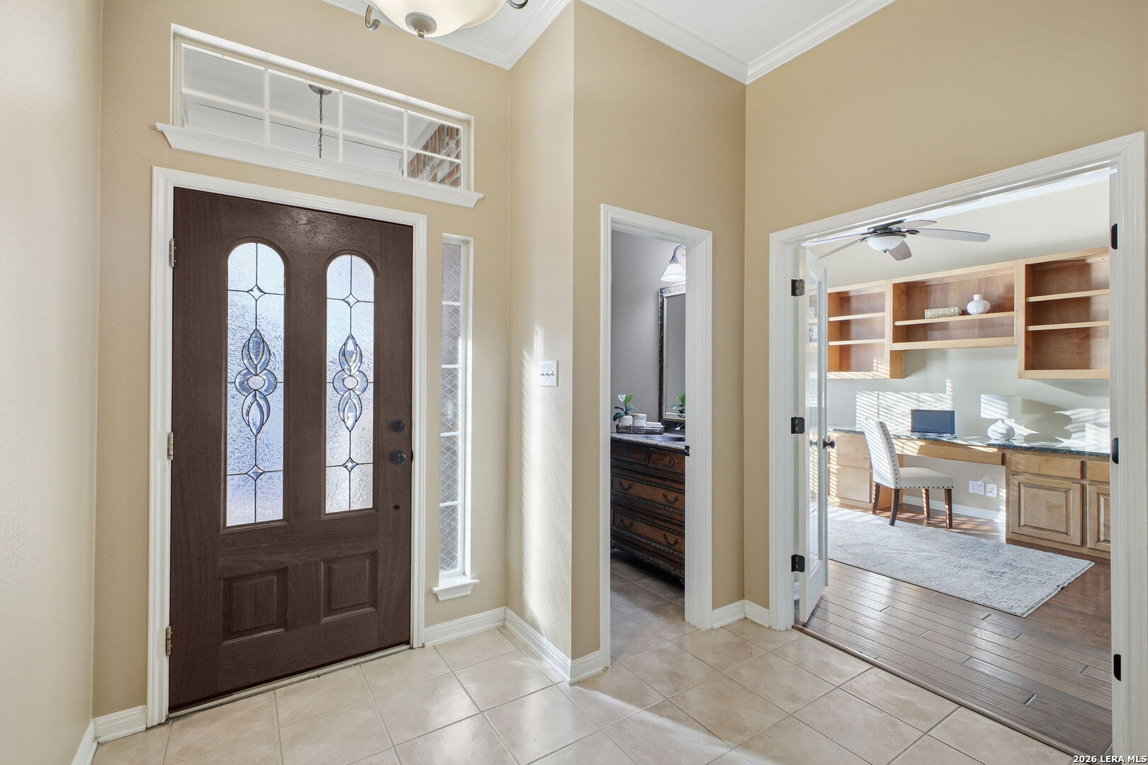527 Mesa Ridge San Antonio, TX 78258 - Photo 7 of 36 a view of a hallway with dining area and front door