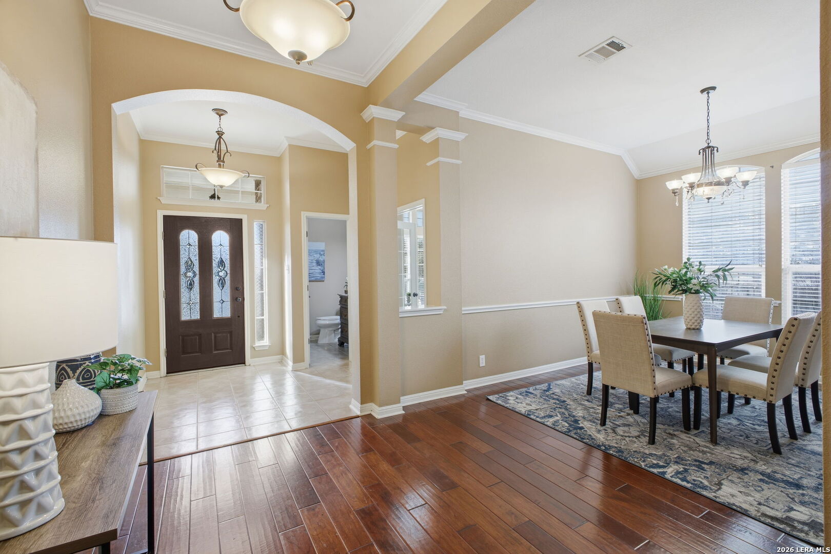 527 Mesa Ridge San Antonio, TX 78258 - Photo 10 of 36 a view of a dining room with furniture window and wooden floor