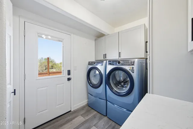 a view of house with backyard and shower