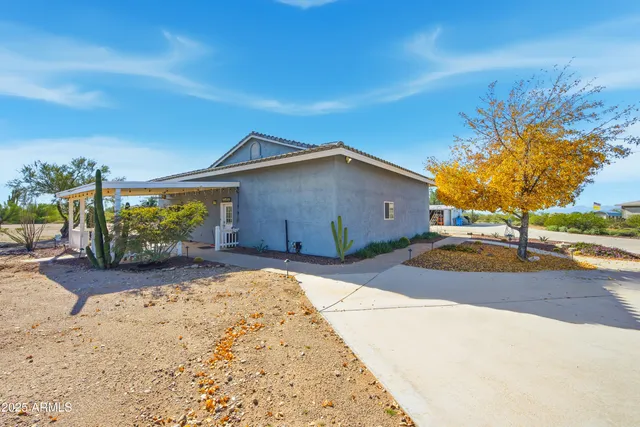 a view of a porch with a floor to ceiling window