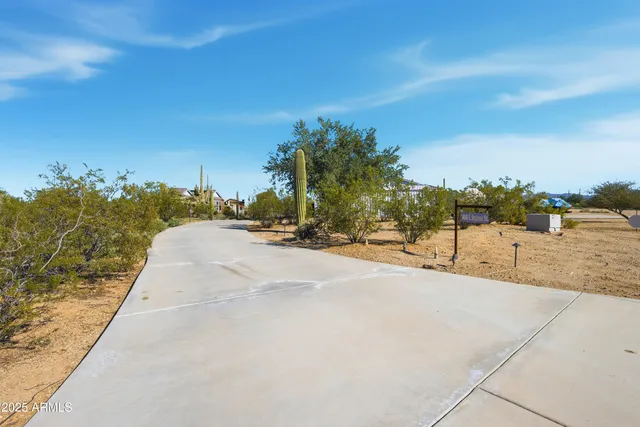 a view of workspace with wooden floor windows