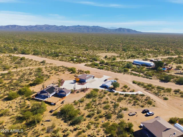 an aerial view of residential building with parking space