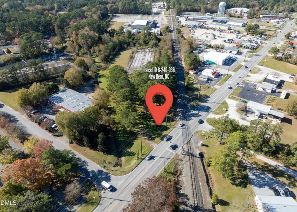 a aerial view of a house with a swimming pool