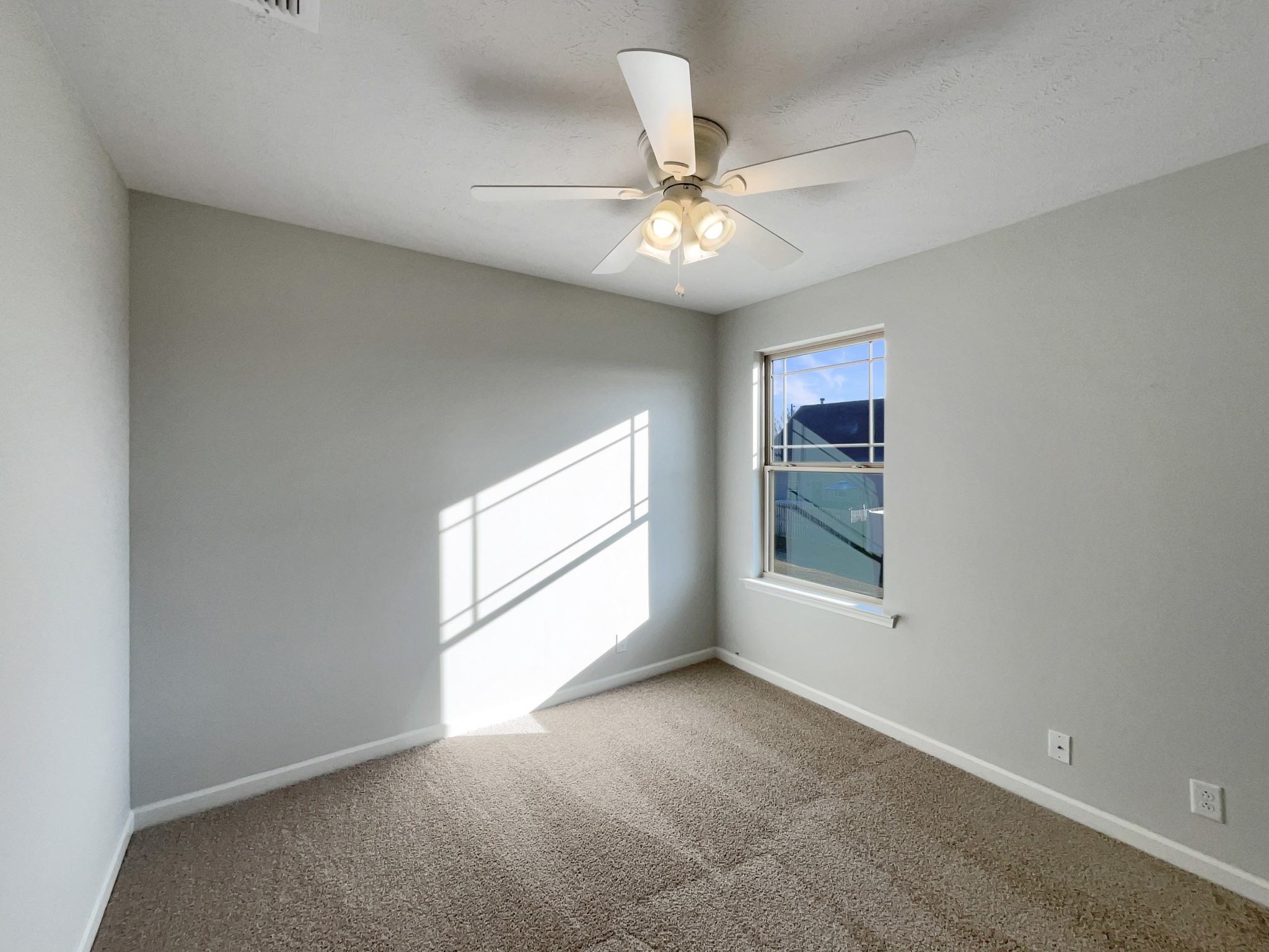 113 Copper Leaf Road Murfreesboro, TN 37128 - Photo 18 of 23 an empty room with windows and fan