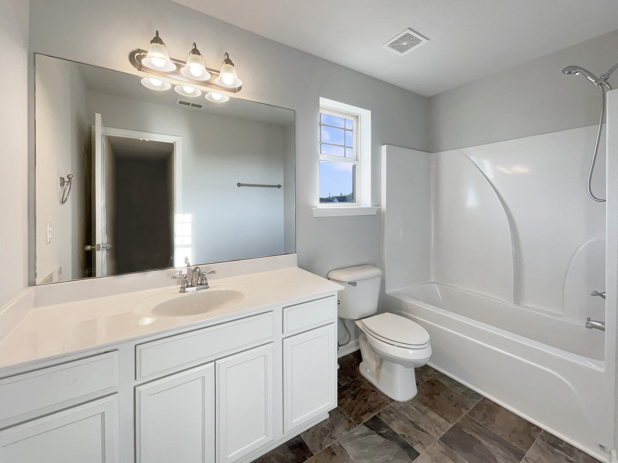 113 Copper Leaf Road Murfreesboro, TN 37128 - Photo 20 of 23 a bathroom with a toilet sink and mirror
