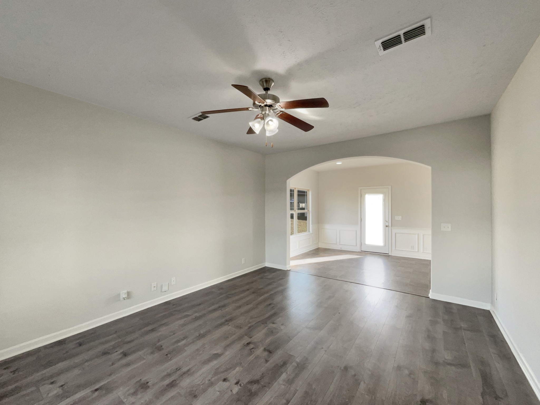 113 Copper Leaf Road Murfreesboro, TN 37128 - Photo 21 of 23 a view of an empty room with window and wooden floor