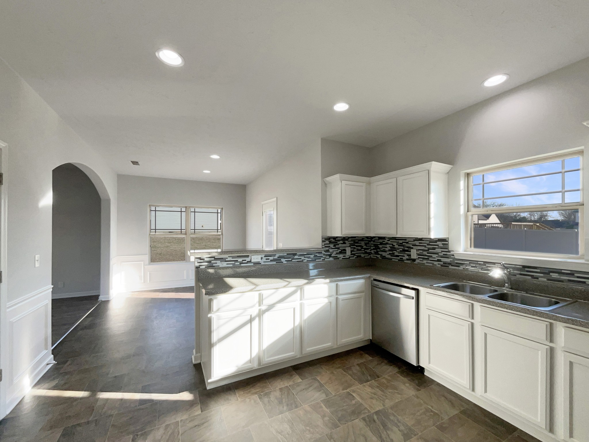 113 Copper Leaf Road Murfreesboro, TN 37128 - Photo 9 of 23 a kitchen with stainless steel appliances granite countertop a stove a sink and a refrigerator