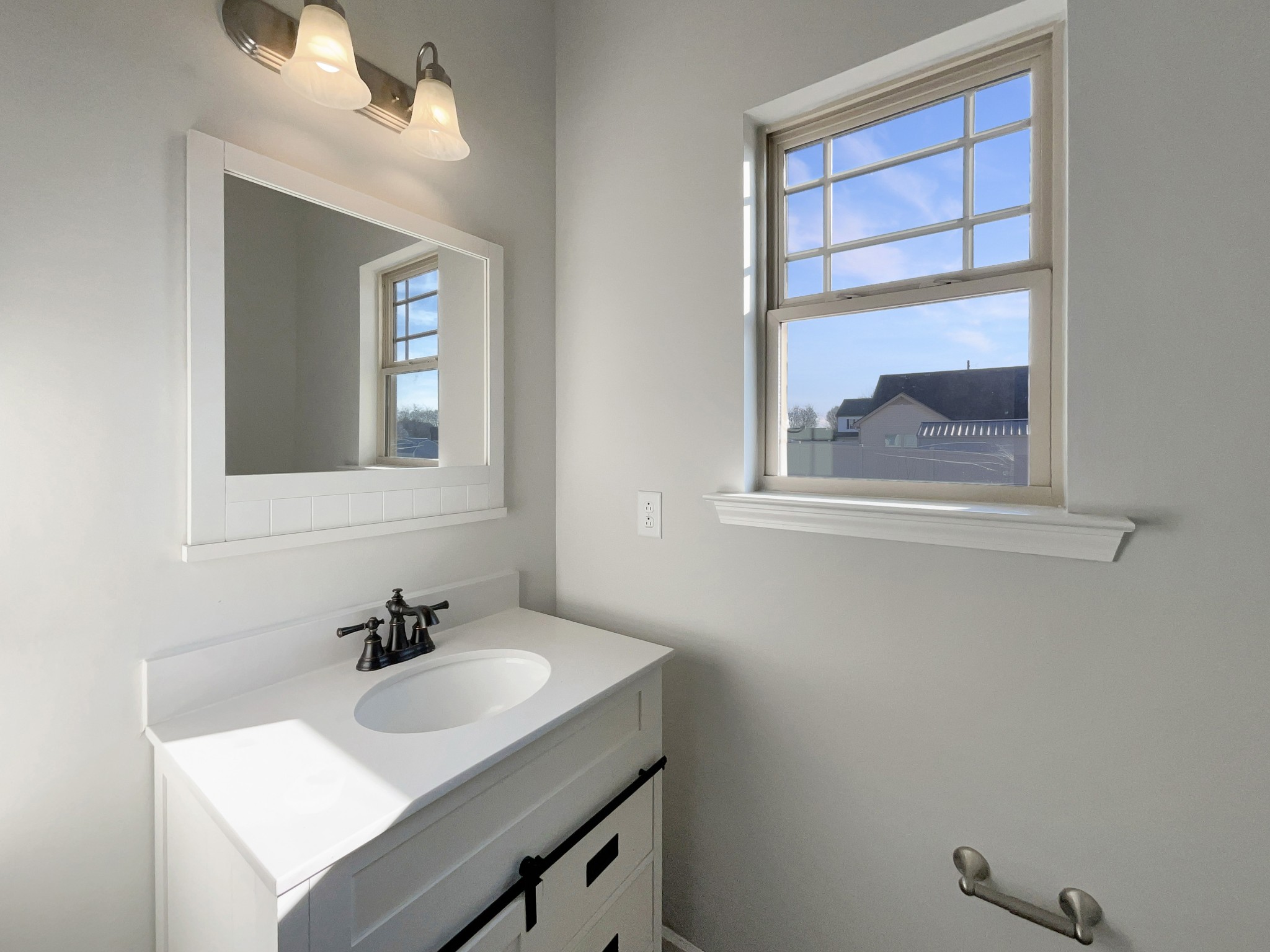 113 Copper Leaf Road Murfreesboro, TN 37128 - Photo 10 of 23 a bathroom with a sink and a mirror