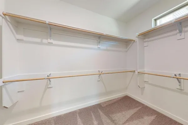 a view of a room with racks on the wall