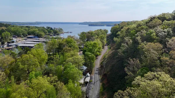 a view of a lake with a building in front of it