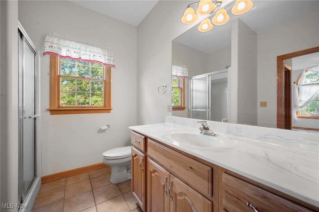 1832 Sandy Lake Road Ravenna, OH 44266 - Photo 13 of 48 First floor bath open to great room and 2nd first floor bedroom/flex room