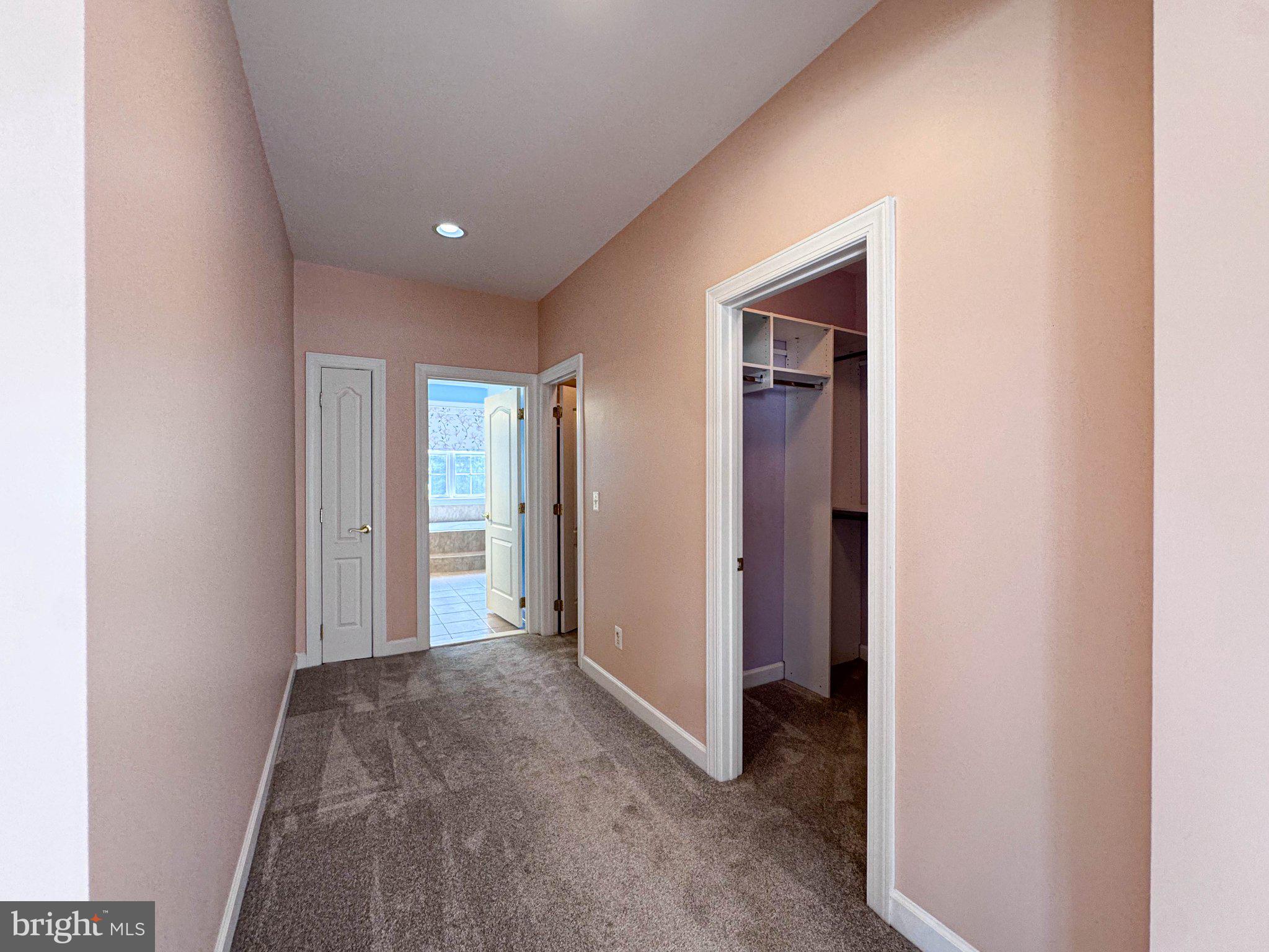 22827 Oakgrove Road Sterling, VA 20166 - Photo 31 of 56 Inviting hallway with soft hues.
