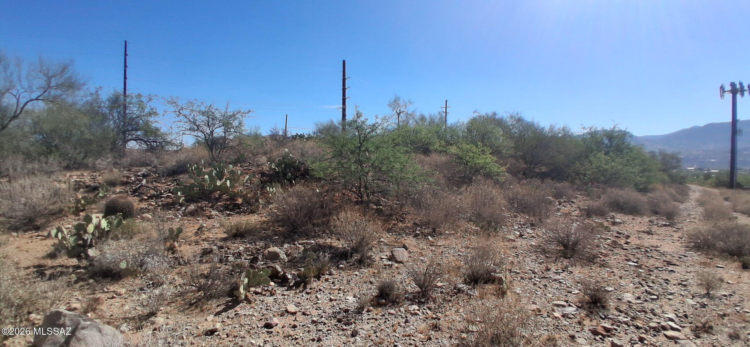 3630 East Edwin Road Tucson, AZ 85739 - Photo 3 of 6 a view of a city with green field