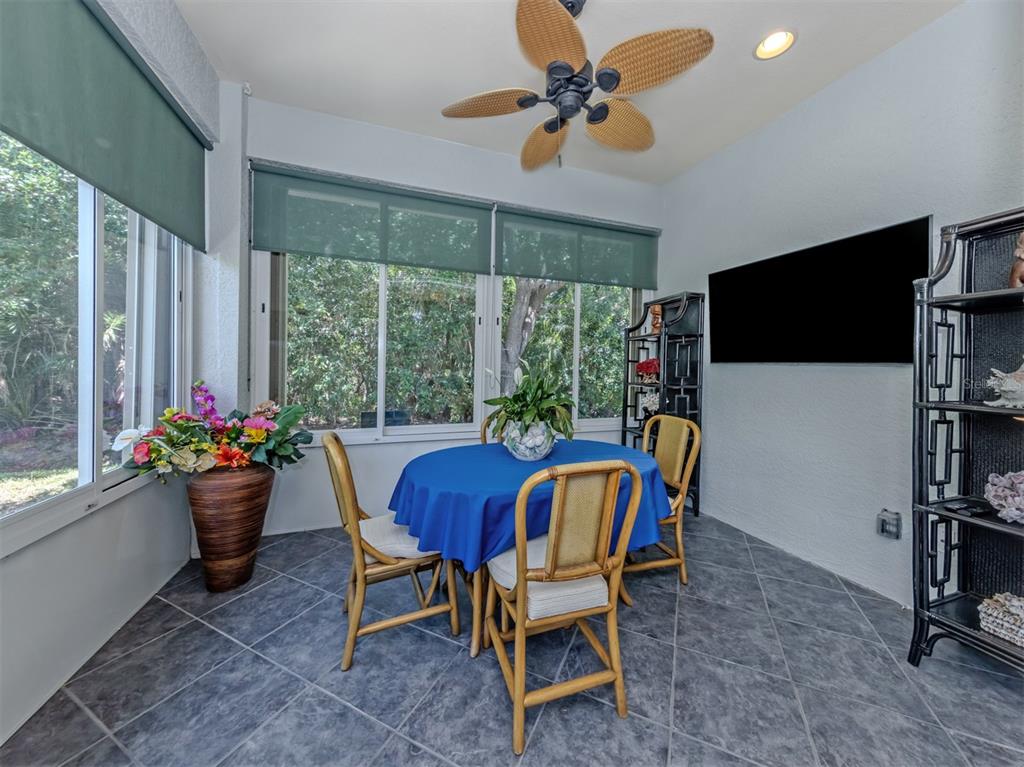 205 Reclinata Circle Venice, FL 34292 - Photo 15 of 62 a view of a dining room with furniture window and outside view
