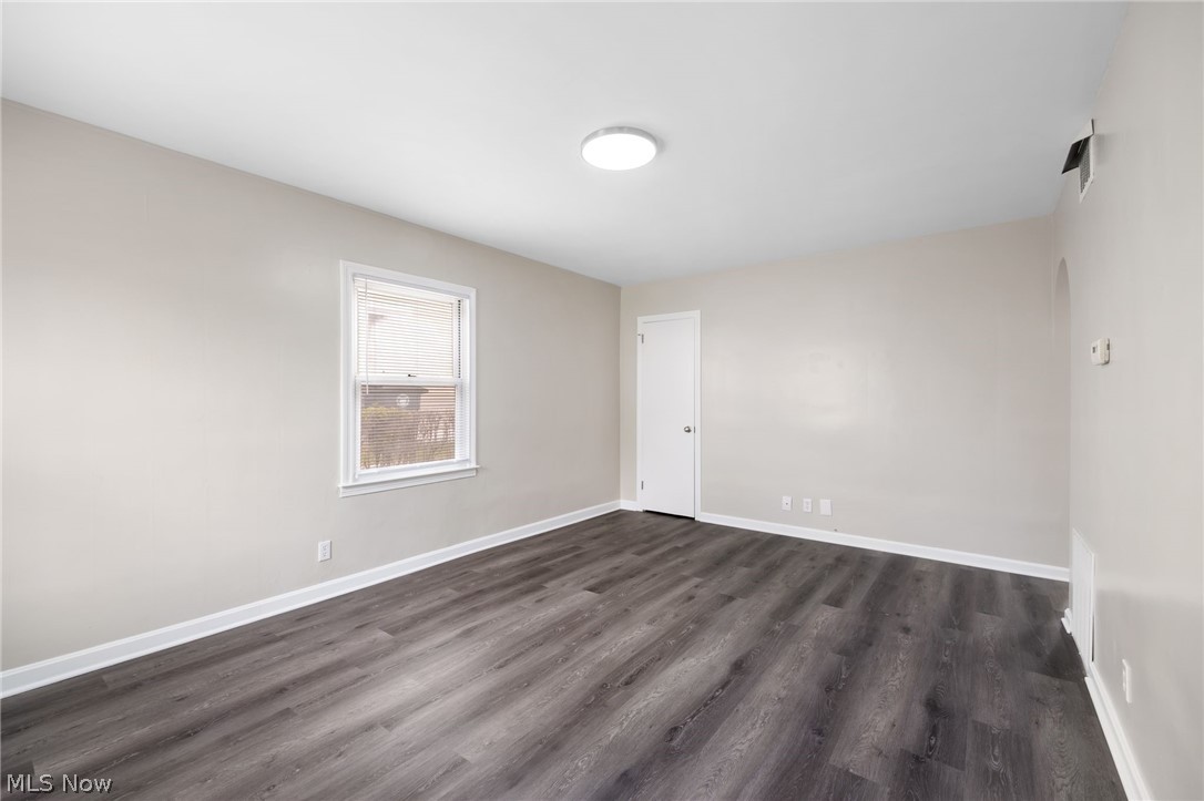 878 Reed Avenue Akron, OH 44306 - Photo 10 of 29 Empty room featuring dark hardwood / wood-style flooring