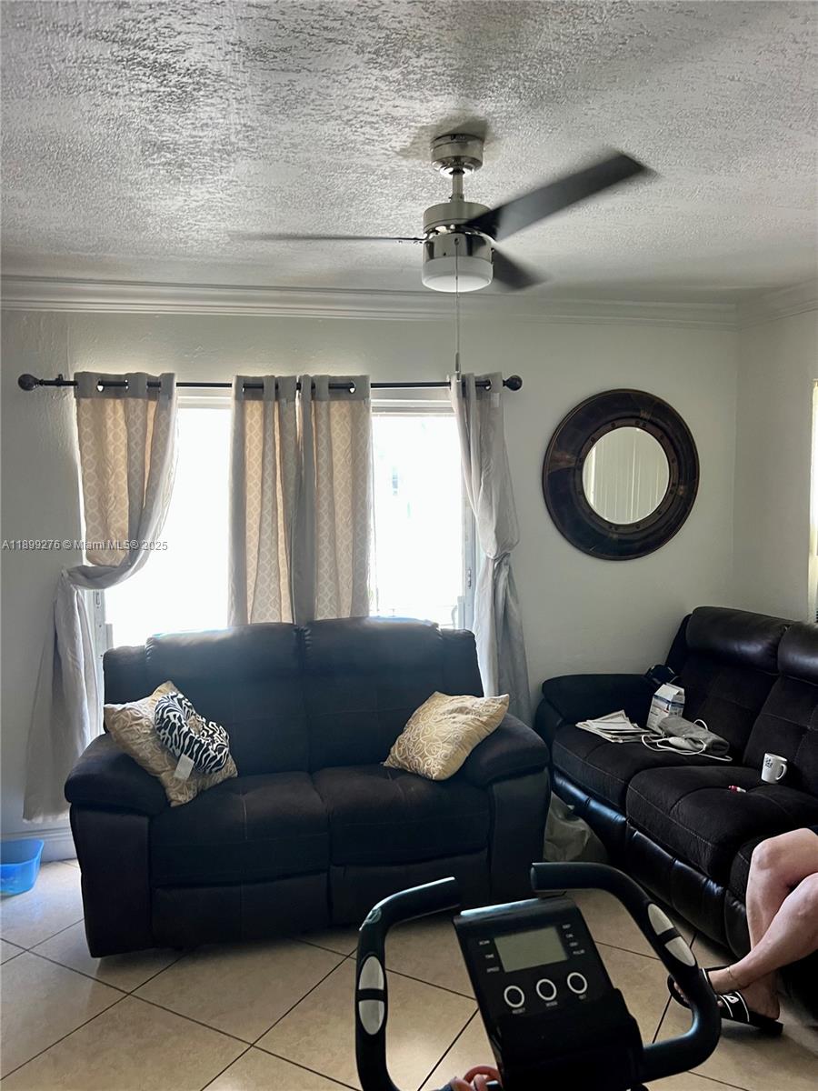 855 West 29th Street, Unit 11 Hialeah, FL 33012 - Photo 4 of 11 a living room with furniture