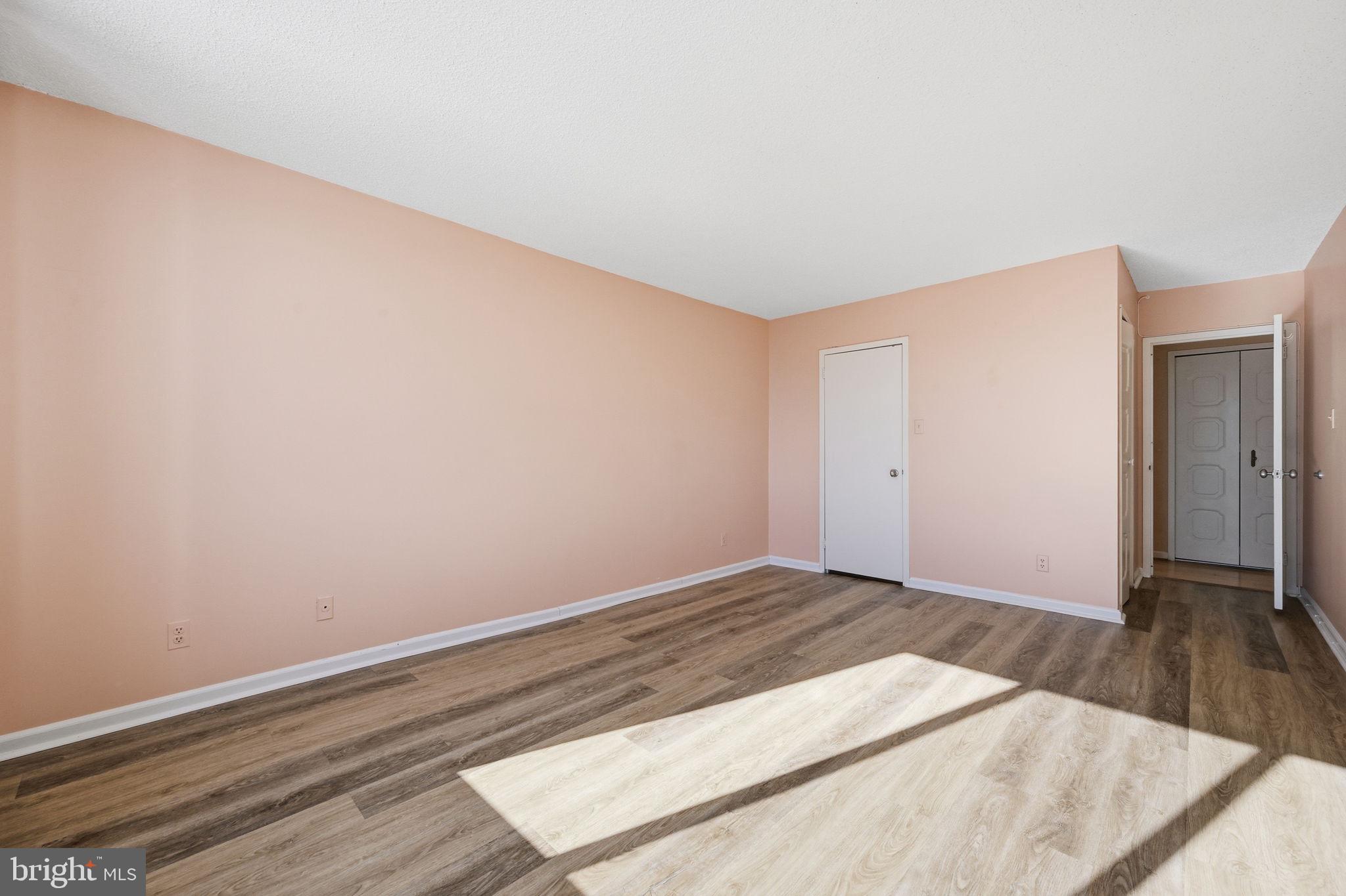 5225 Pooks Hill Road, Unit 519N Bethesda, MD 20814 - Photo 15 of 56 a view of a room with wooden floor