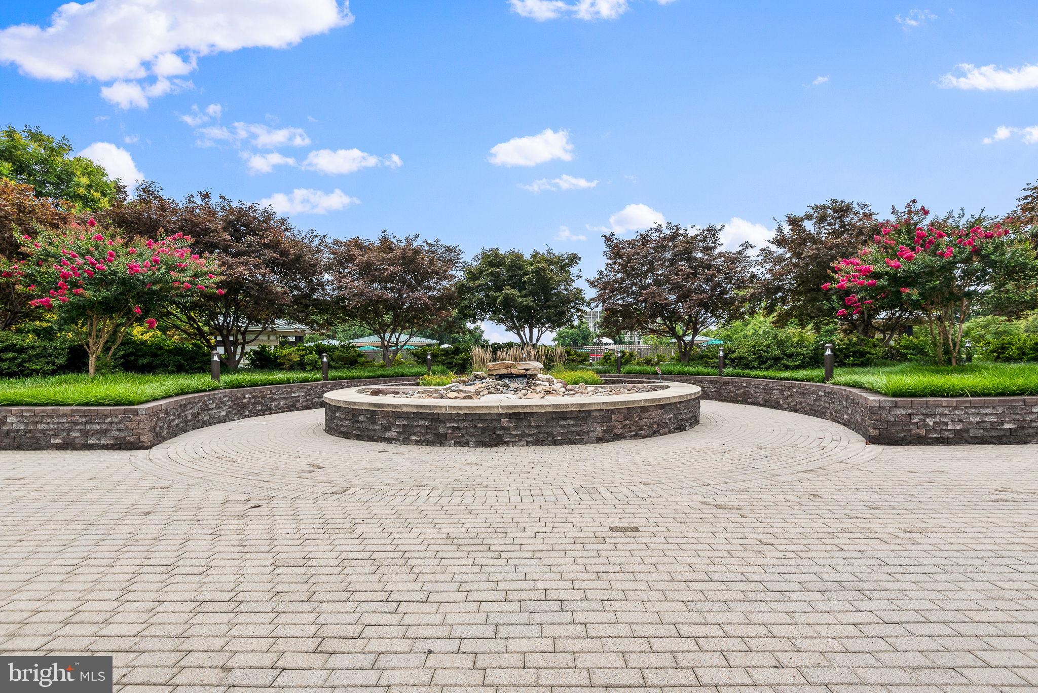5225 Pooks Hill Road, Unit 519N Bethesda, MD 20814 - Photo 42 of 56 a view of a garden with a slide