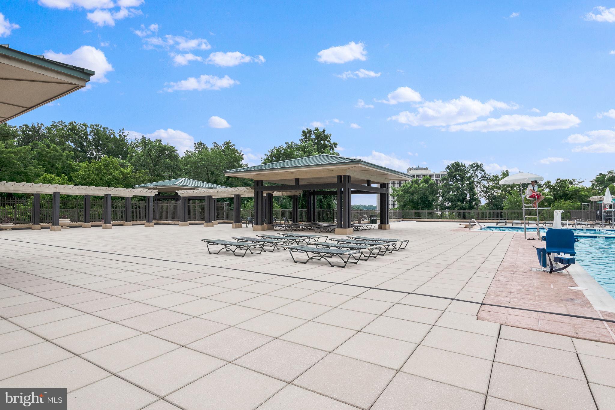 5225 Pooks Hill Road, Unit 519N Bethesda, MD 20814 - Photo 47 of 56 a view of a house with backyard porch and sitting area