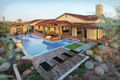 an aerial view of a house with swimming pool