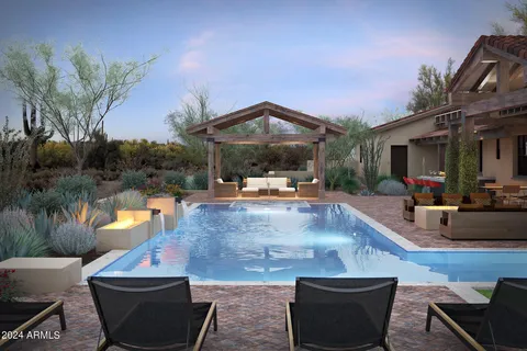 swimming pool view with a seating space