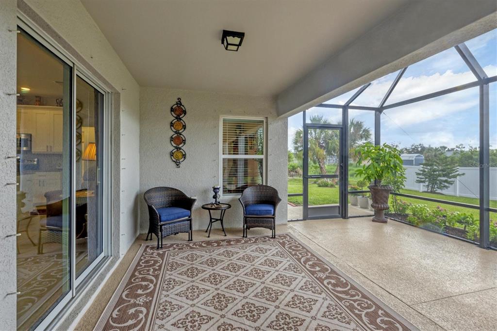 2694 Hopwood Road North Port, FL 34287 - Photo 31 of 56 a living room with furniture and a large window