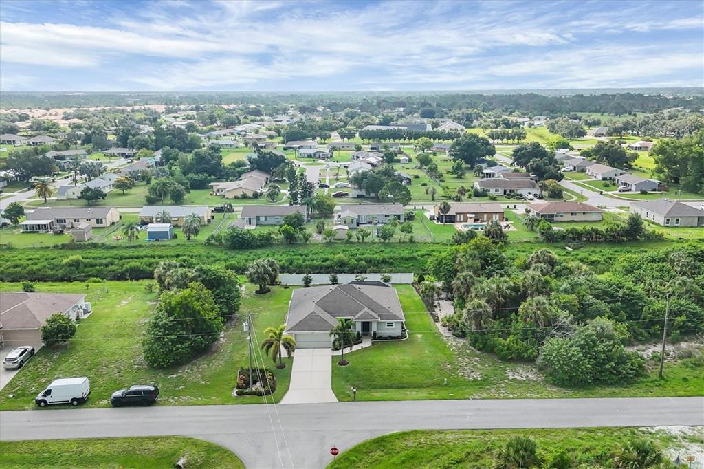 2694 Hopwood Road North Port, FL 34287 - Photo 10 of 56 an aerial view of residential houses with outdoor space and river