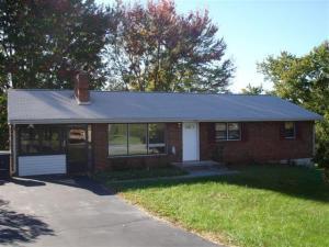 front view of a house with yard