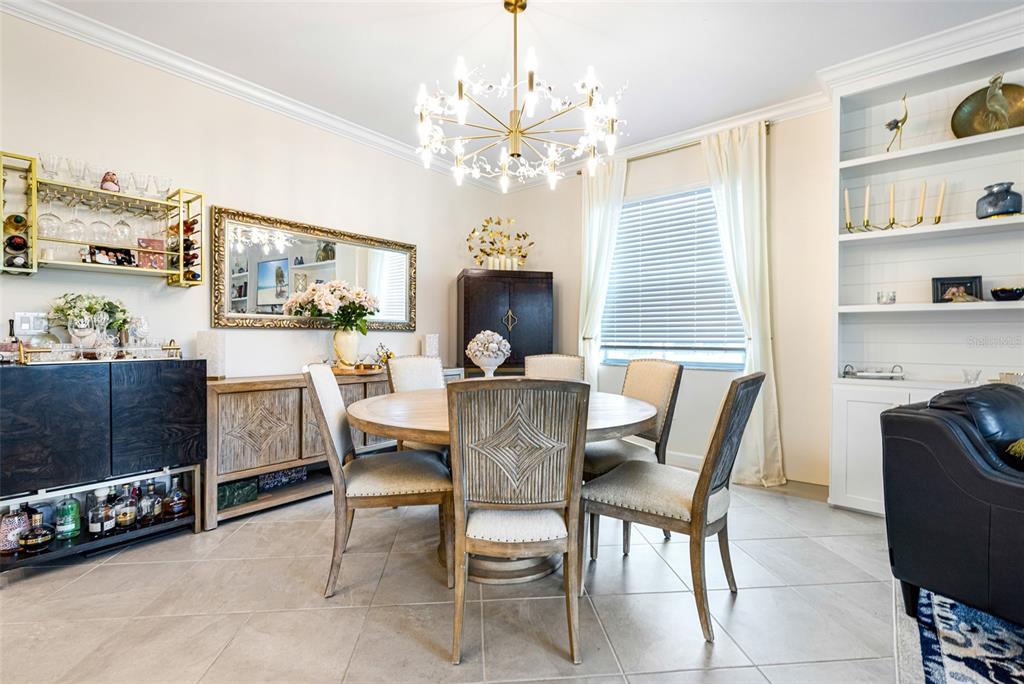17424 Muscat Lane Punta Gorda, FL 33955 - Photo 13 of 32 a view of a dining room with furniture and chandelier