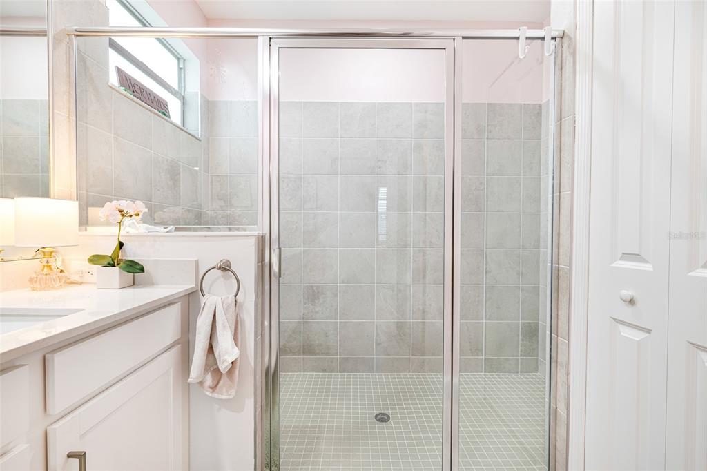 17424 Muscat Lane Punta Gorda, FL 33955 - Photo 22 of 32 a bathroom with a sink and a shower