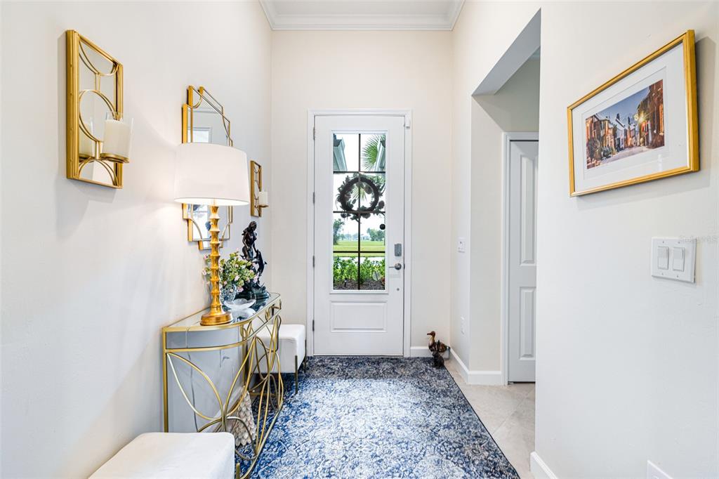 17424 Muscat Lane Punta Gorda, FL 33955 - Photo 3 of 32 a living room with furniture and a potted plant