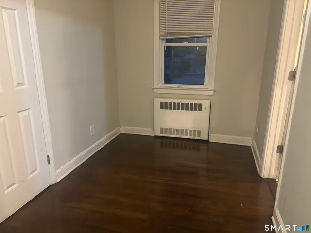 a bed room with a bed and a couch