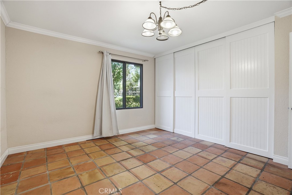 20702 El Toro Road, Unit 231 Lake Forest, CA 92630 - Photo 9 of 36 a view of an empty room with a window