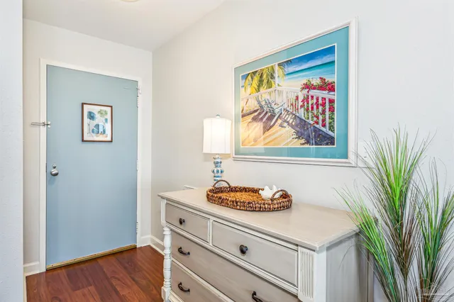 a kitchen with a stove and cabinets