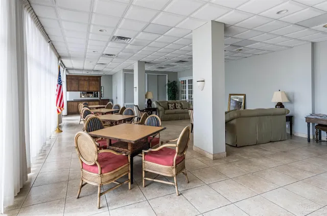 a view of a street with a building in the background