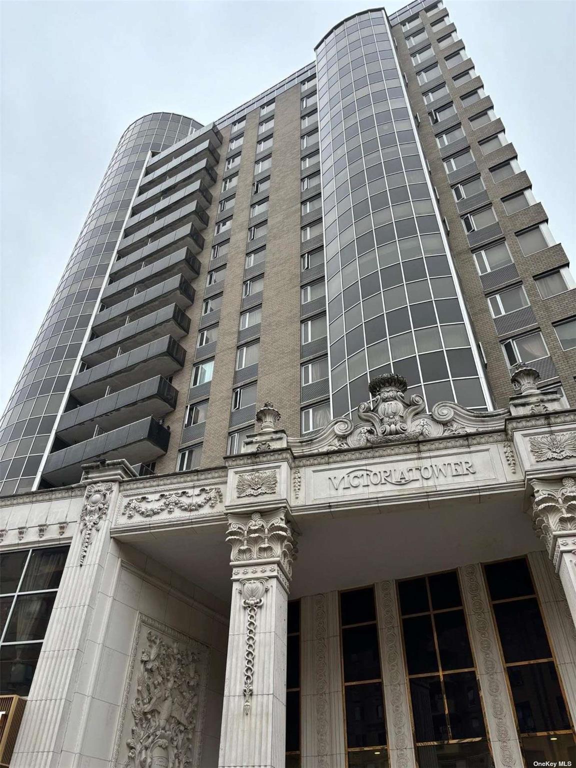 133-38 Sanford Avenue, Unit 9C Queens, NY 11355 - Photo 1 of 9 a view of a large building